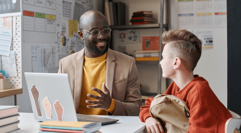 presenting video presentation Teacher with a student with a laptop